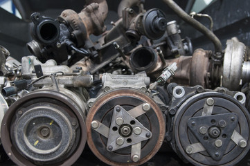 Fototapeta na wymiar bunch of old car parts, generators