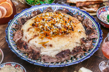 Iranian pilaf with tahdig and lamb close view