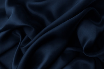 Close-up of blue soft silk, background texture