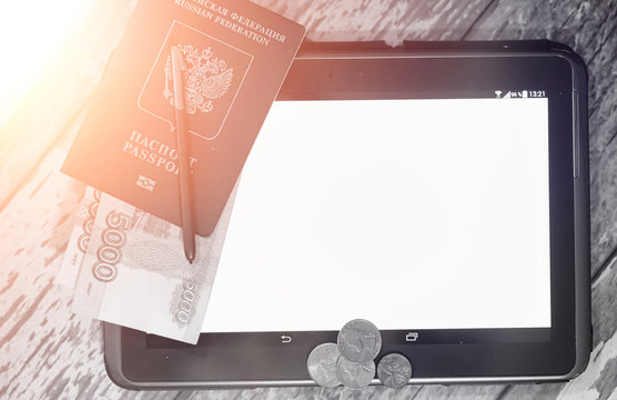 The graph of income growth. Electronic tablet with a graph of gr