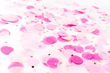 Background of pale pink paper confetti, holiday concept
