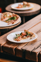 Pizza carbonara on rustic wooden table. Food photography concept
