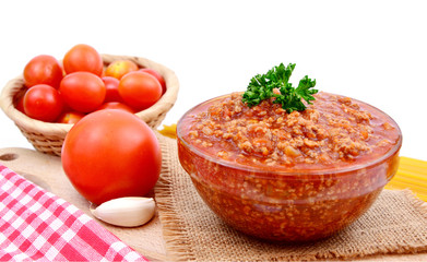 Bolognese Sauce with Spaghetti and tomatoes on white background.