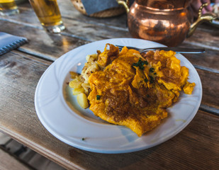 Traditional  south tyrolean dish with omelette and potatoes