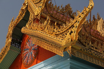 Exterior colorful gable design and decoration of a siamese buddhist temple monastery on Sagaying...