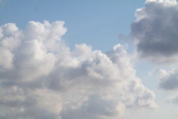 sunny day and cumulus clouds near the Mediterranean sea 