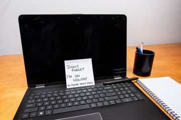 lap top with post it note