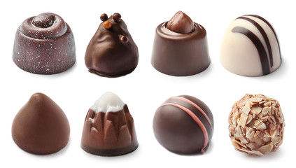Set with delicious chocolate candies on white background
