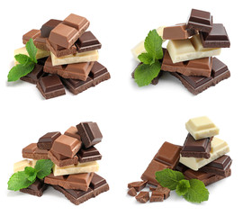 Set with different kinds of delicious chocolate and mint on white background