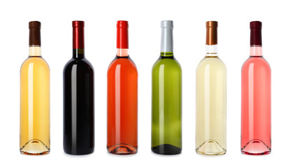 Fototapeta na wymiar Set with different blank wine bottles on white background