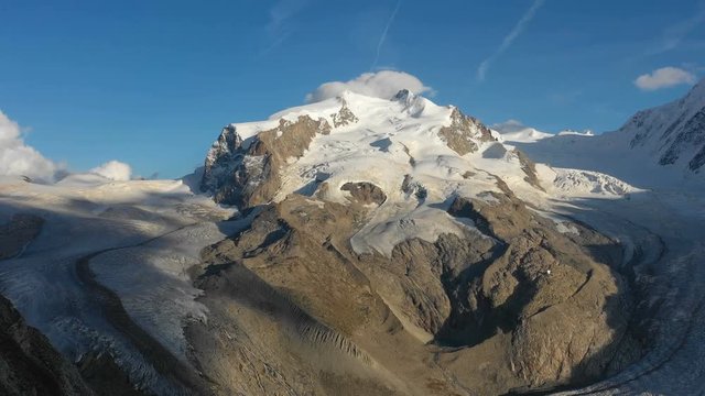 Aerial view of the Monte Rosa Alps with the Dufourspitze, the highest mountain in Switzerland in the evening light in Zermatt, Switzerland