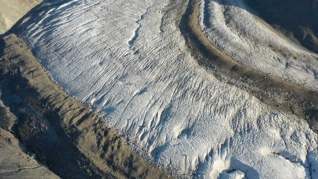 Aerial view of the Gorner glacier with its crevasses in the evening light in Zermatt, Switzerland