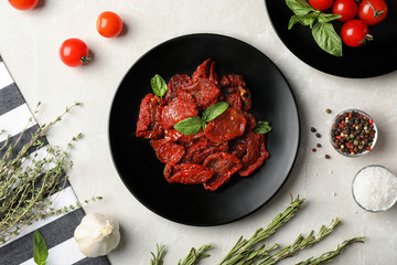 Flat lay composition with dried tomatoes on table - obrazy, fototapety, plakaty