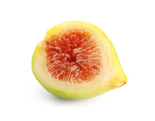 Half of ripe green fig on white background
