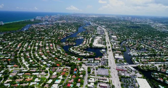 FORT LAUDERDALE SUBURB PAN LEFT VIEW DT AND BEACH 1