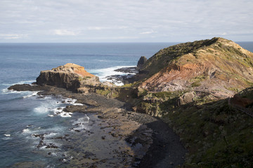 Landscape of ocean cliffs with shadows