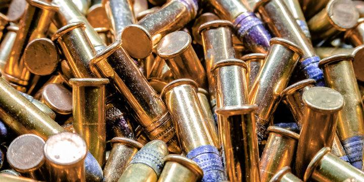 Barrel shaped bullets with gold plated case