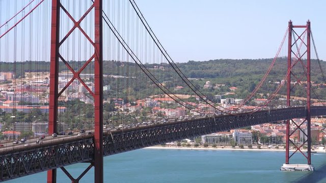 25 of April Bridge (Ponte 25 de Abril) – a suspension bridge over Tagus river. Lisbon. Portugal