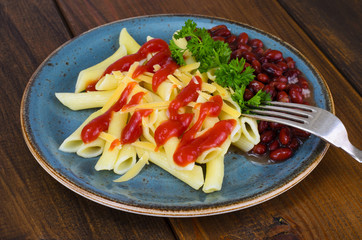 Pasta and beans in tomato sauce