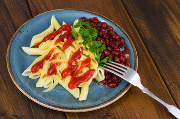 Pasta and beans in tomato sauce