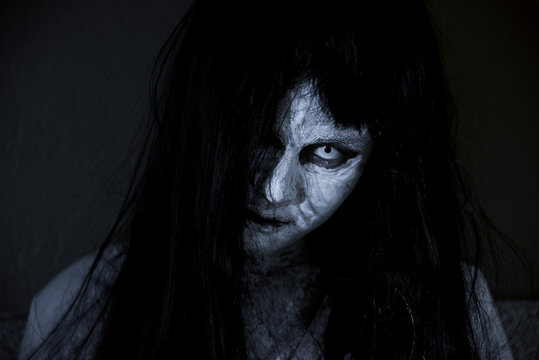 Close up face of horror woman ghost cruel,