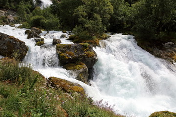 Fototapeta na wymiar Waterfall Briksdalsbreen in Norway