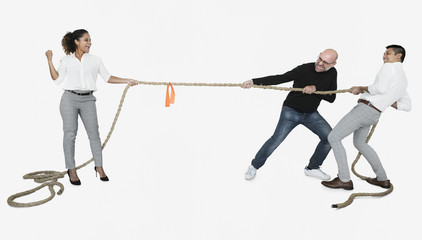 Diverse business people tugging on a rope