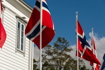 Norwegian flags in front of building