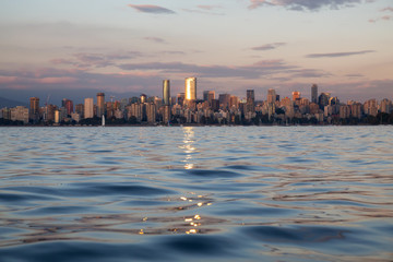 Downtown Vancouver Skyline during a vibrant summer sunset. Located in British Columbia, Canada.