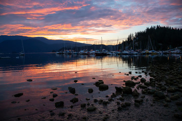 Fototapeta premium Beautiful view of Deep Cove during a colorful summer sunrise. Taken in North Vancouver, BC, Canada.