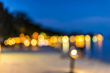 Abstract blur image of Outdoor Cafe or restaurant in night time with bokeh for background usage ....