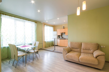 Home Interior With Open Plan Kitchen, Lounge And Dining Area
