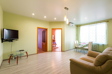 Home Interior With Open Plan Kitchen, Lounge And Dining Area