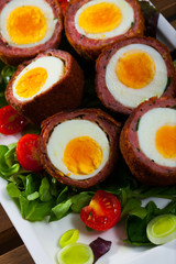 Scotch eggs with vegetable salad