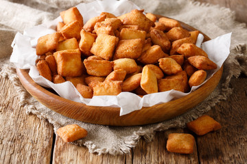 Chin chin is a fried snack in West Africa, mostly in Nigeria served in a plate on a close-up....