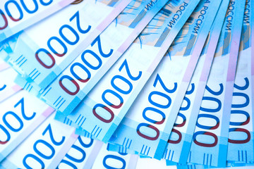 Russian money banknotes currency rouble on white isolated background. in nominal value of two...