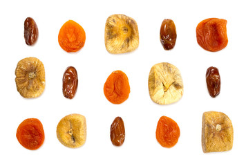 dried fruits, dates, figs, dried apricots isolated on white background