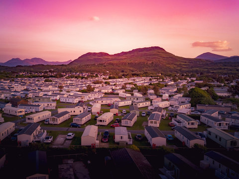 Sun Set At A Caravan And Camping Park, Static Home Aerial View. Porthmadog Holiday Park Taken From The Air By A Drone