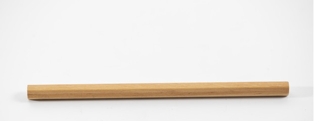 brown pencil on the white background