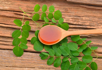 Honey on wooden background