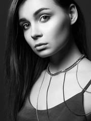 Pretty Girl with chain necklace on the shoulder