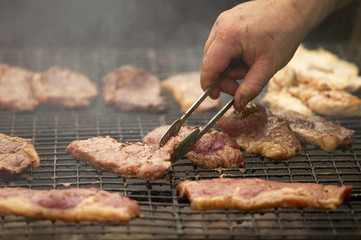 CHICKEN BEEF AND PORK STEAKS ON BARBECUE
