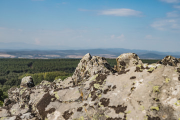 stones on top of a hilltop with valley views
