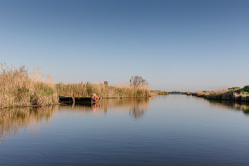 Wooden boat on a river in Evros Delta, Greece