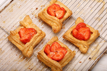 Puff pastry cake with strawberry in bakery