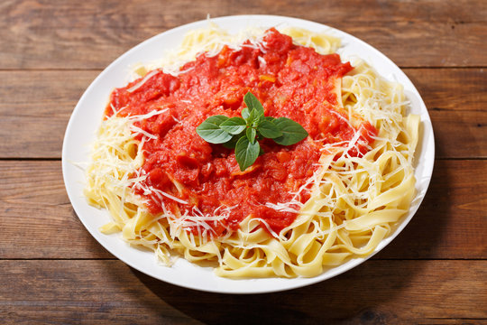 plate of pasta with tomato sauce