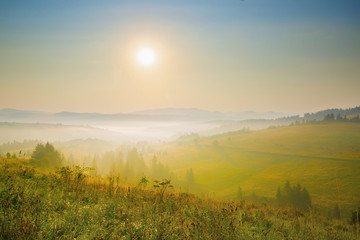Beautiful sunset in the mountains. Carpathian, Ukraine. Autumn landscape which including of copy-space for text.