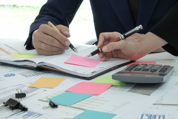 Businessman with secretary working.