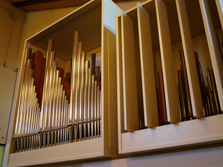 Fototapeta premium Modern steel organ pipe in a church