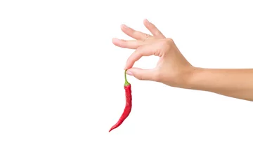 Gardinen Chilischoten Woman's fingers holding a beautiful red hot chili pepper. Isolated on white background. Empty place for text.  © fotoduets